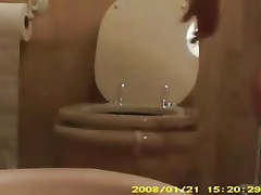 NOT My mom in toilet washing pussy. Hidden cam